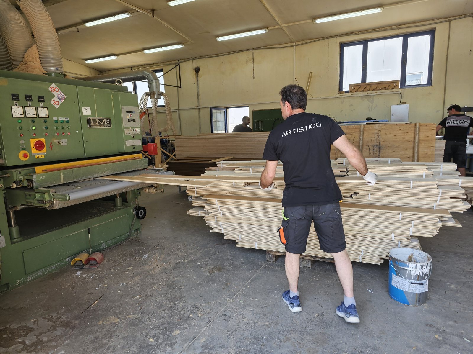 Calibrating engineered boards on a wide-belt sander
